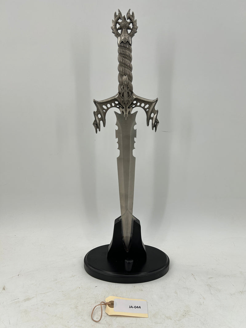 Gothic Fantasy Dagger – Ornate Metal Hilt with Serrated Blade and Wooden Display Stand