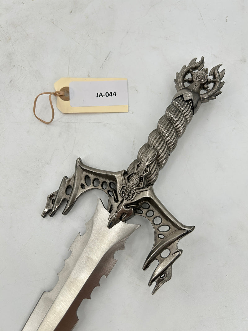 Gothic Fantasy Dagger – Ornate Metal Hilt with Serrated Blade and Wooden Display Stand